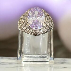 Elegant Silver and Purple Gemstone Ring